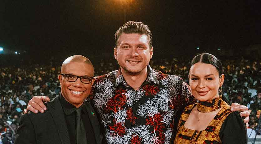 Evangelists Richard Fullwood and Evelina Smane with Daniel Kolenda.