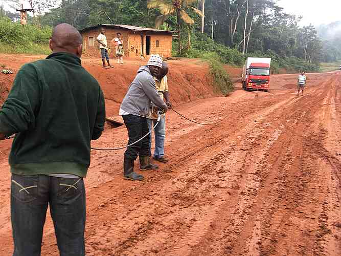 It’s rainy season – trucks must sometimes be pulled out of the mud.