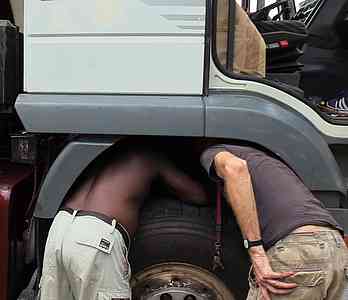 Lawrence and Jaku are fixing a blocked air filter