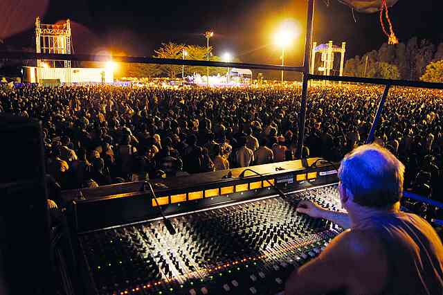 To achieve the best sound possible, the main mixing desk is set up in the middle of the field, about 100 meters from the stage.