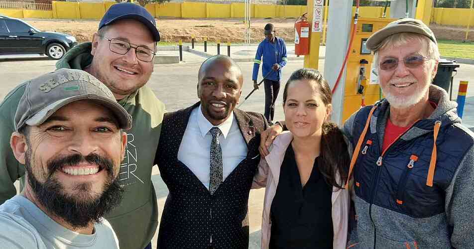 As we were fueling up, Jana Bielava and Harrison Kiwone came out to meet us.