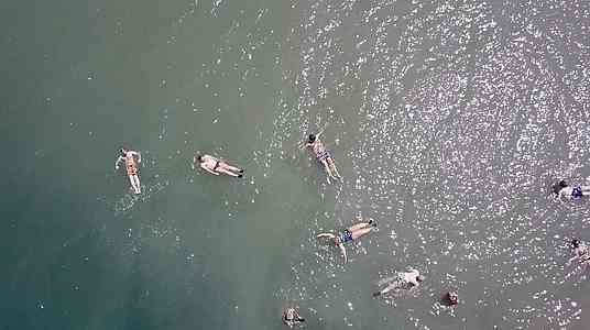 Tour members cool off in the Dead Sea