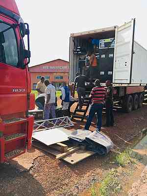 Unpacking for customs to inspect