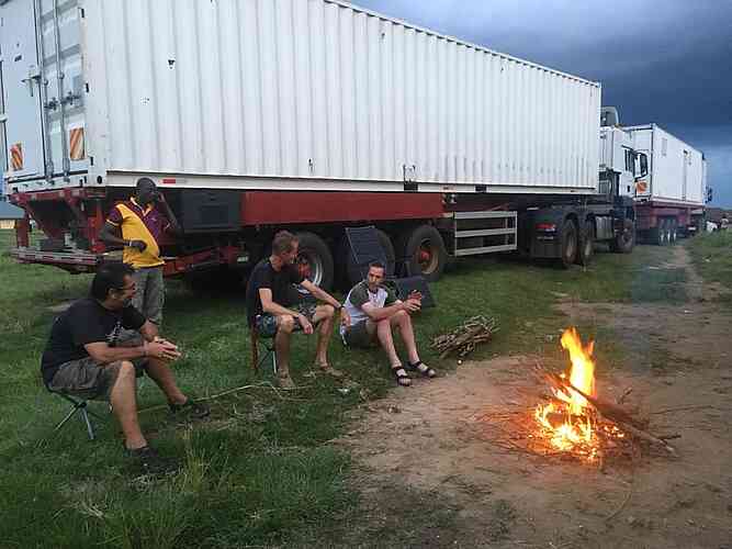 Cooking and fellowship by the light of the fire