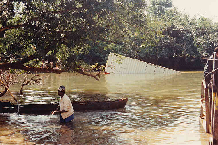 On route to the Conakree, Guinea,  Crusade, disaster struck when the ferry sank under the weight of our CfaN truck.