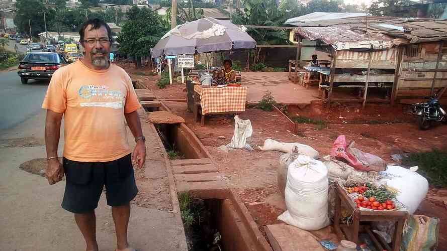 Garry is off to buy food in the nearby market.