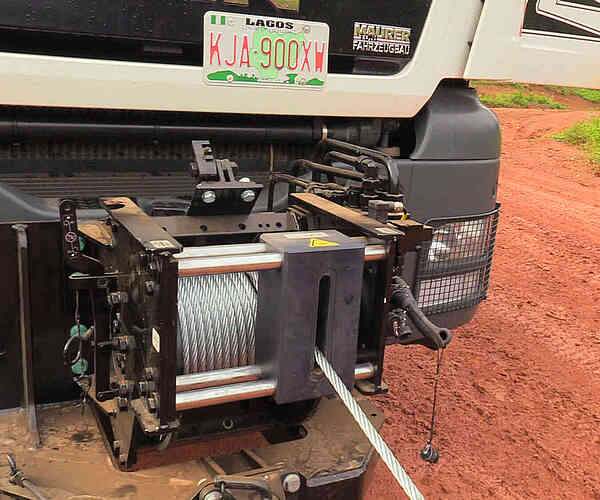 It takes a mighty big winch to pull a truck to safety.