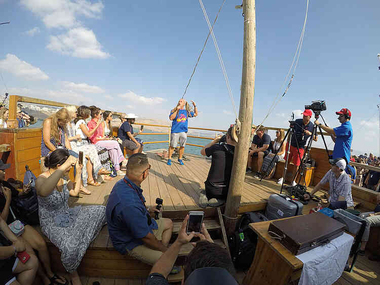 Todd White aboard a boat on the Sea of Galilee