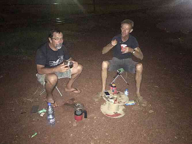Jako and Garry enjoy some hot noodles.