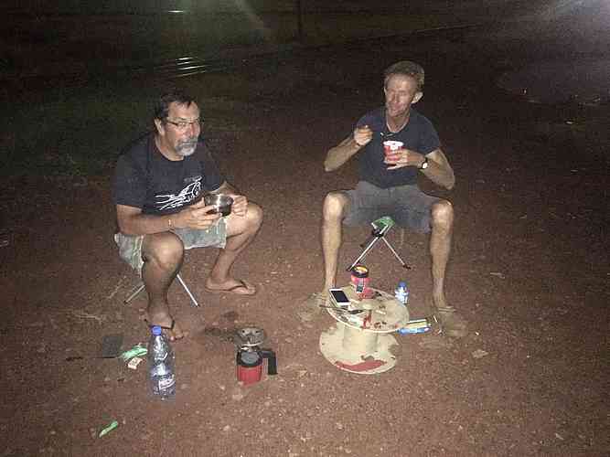 Jako and Garry enjoy some hot noodles.